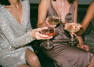 women in dresses with Champagne