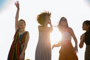 group of women dancing outside