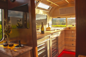 interior of airstream with a variety of wine and wine glasses