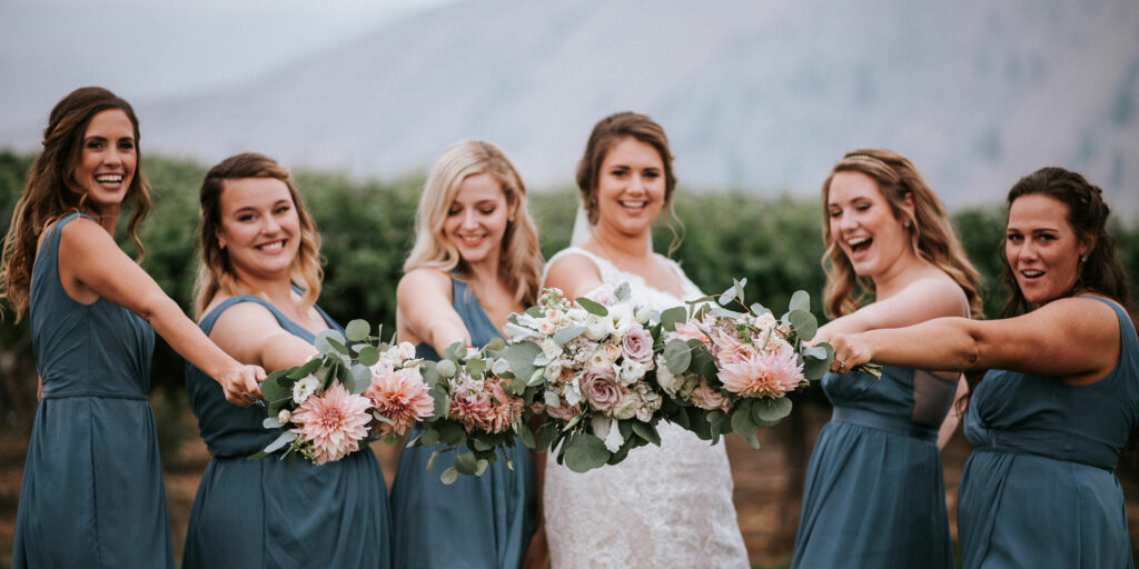 bride with her bridesmaids