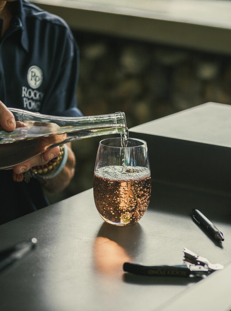 pouring rose in stemless glass