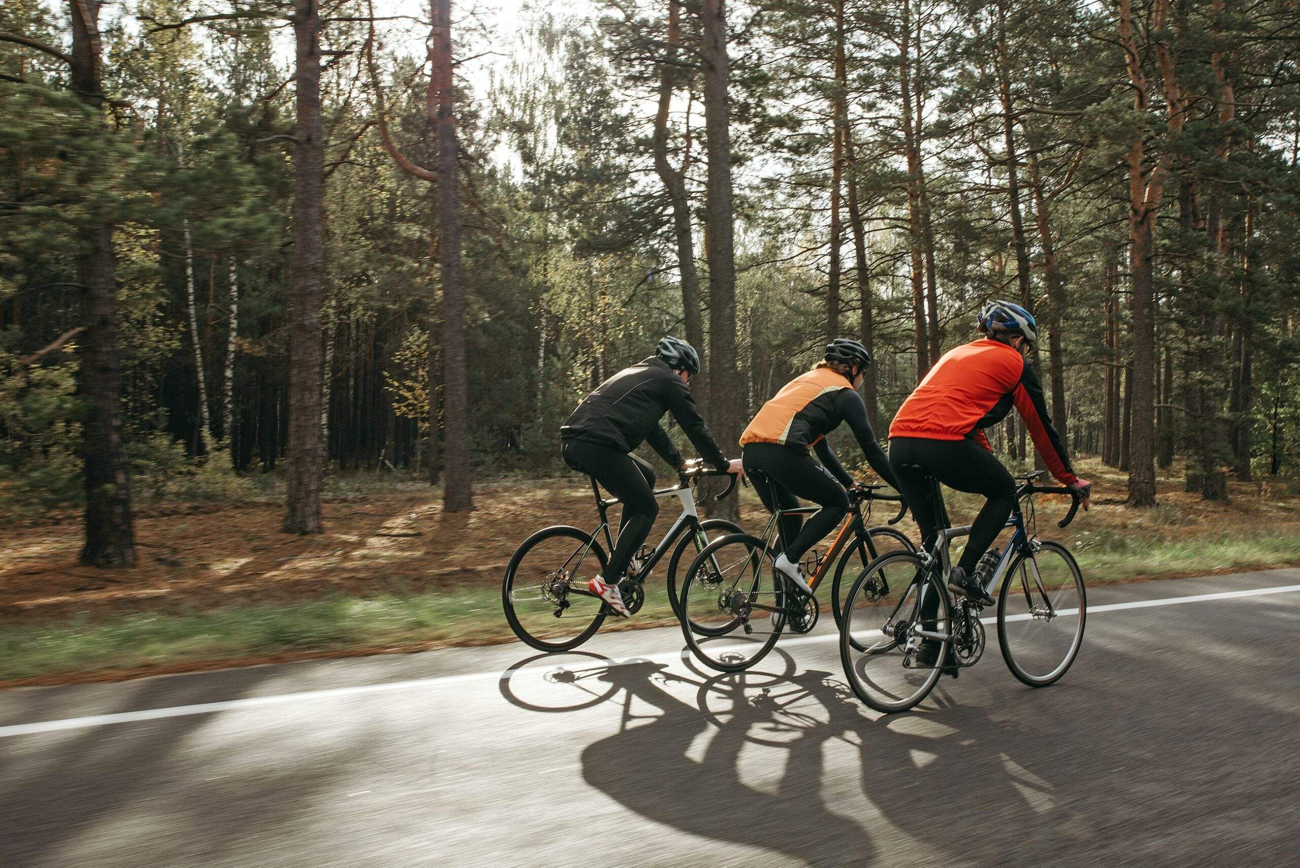3 bikers on a road