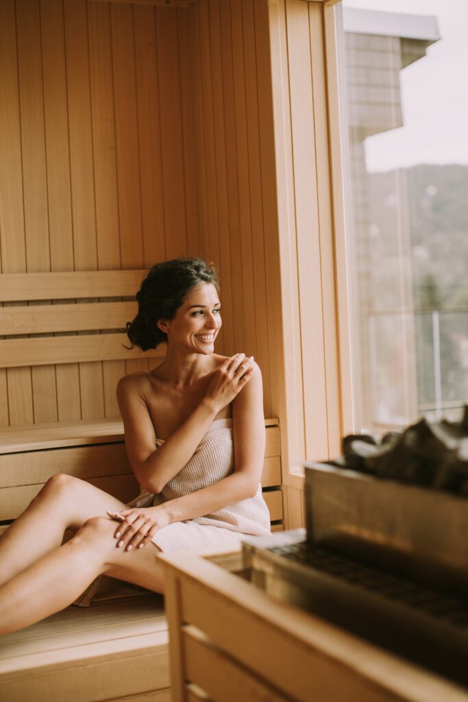 woman in sauna with window